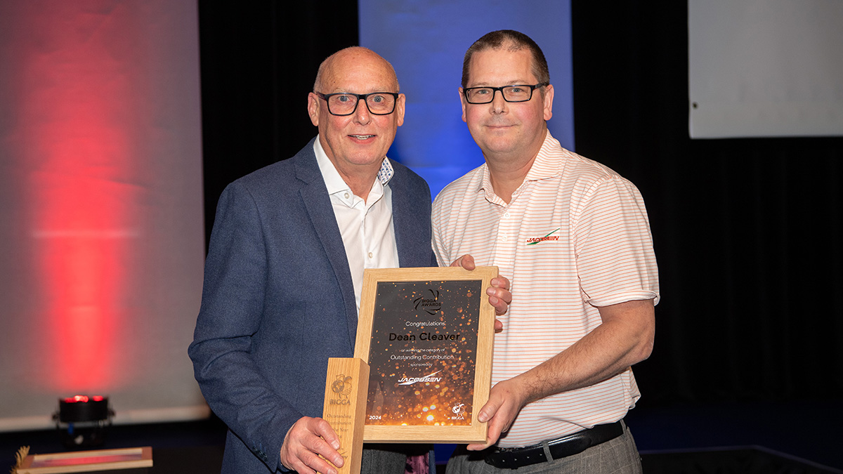 Award winner Dean Cleaver is presented with his award by Jacobsen's Simon Rainger