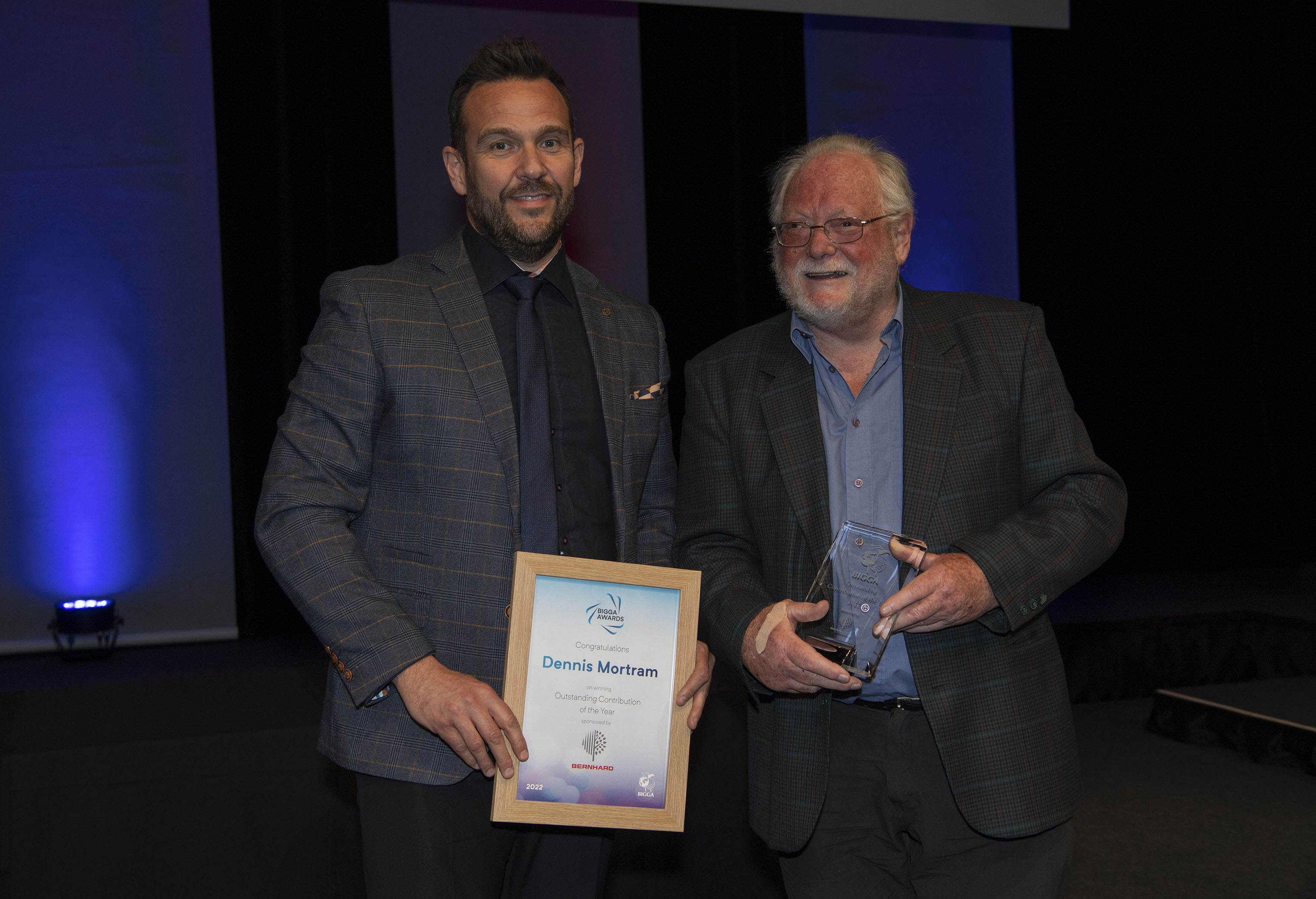 Dennis Mortram (right) was presented with the Outstanding Contribution of the Year Award by Steven Nixon of Bernhard and Company